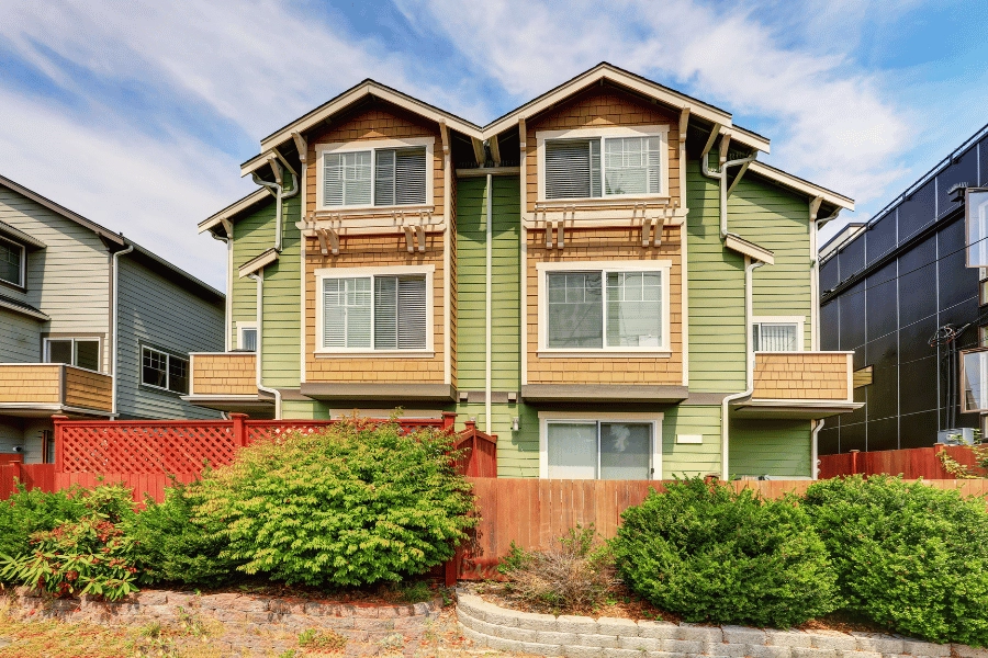 bright green multi-family home for multiple families 